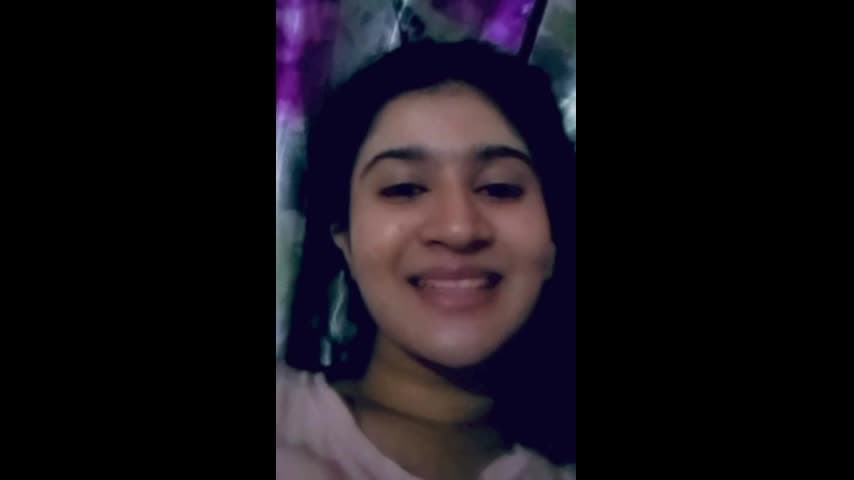 Beautiful cute girl recording herself for her boyfriend