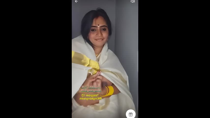 Nila Nambiar Saree Strip on Tango (1)