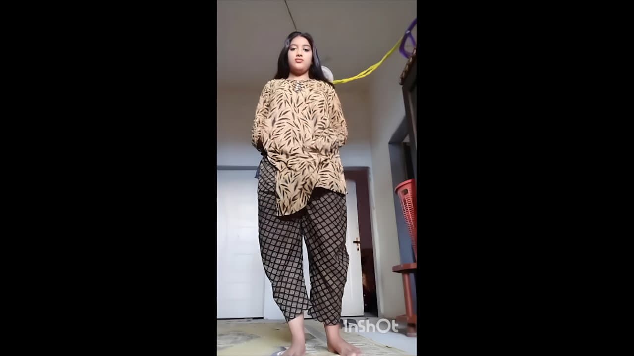 Beautiful Smiling Indian Beauty Tease